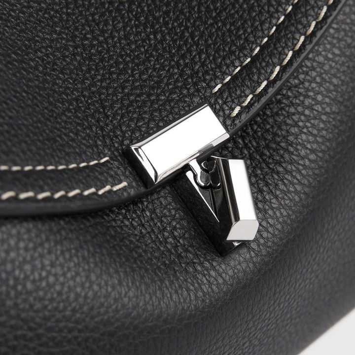 TOTEME - T-Lock grained-leather clutch black