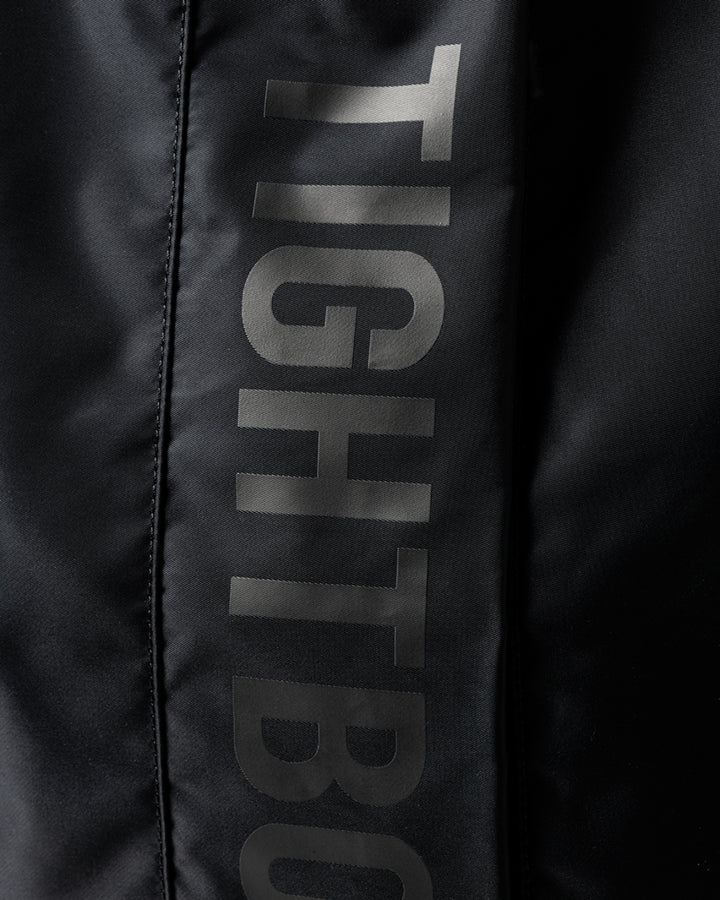 TIGHTBOOTH - LOGO KNAPSAC