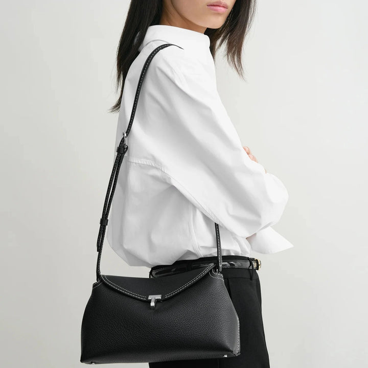 TOTEME - T-Lock grained-leather clutch black