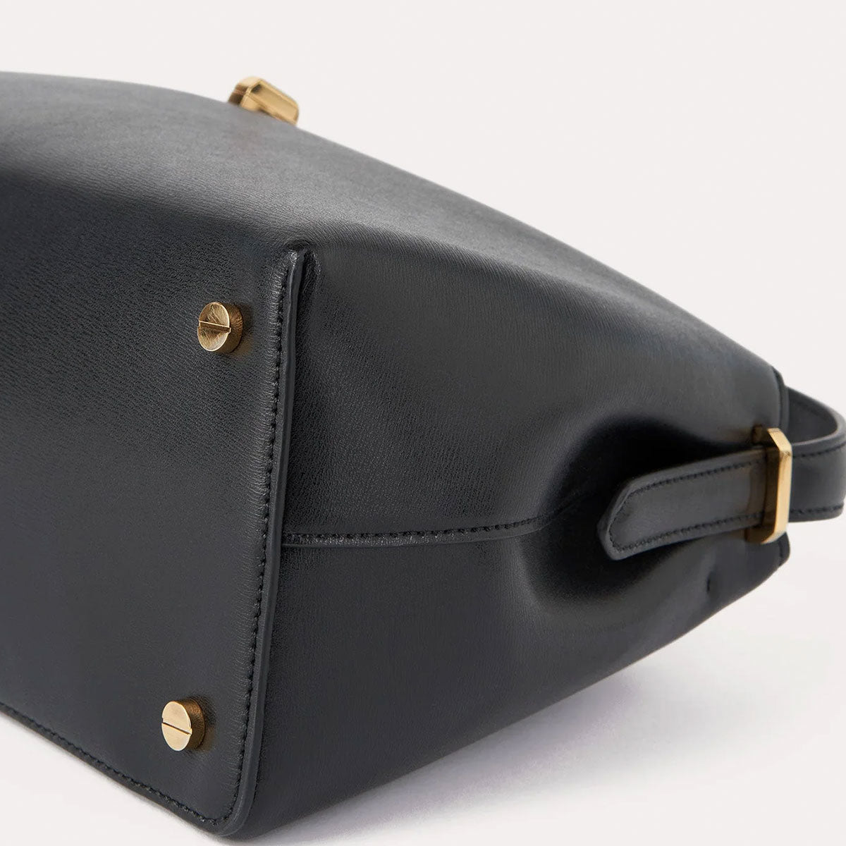 T-Lock Leather Top Handle | Why are you here?