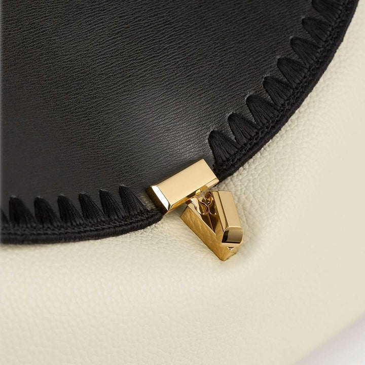 T-lock embroidered leather top handle