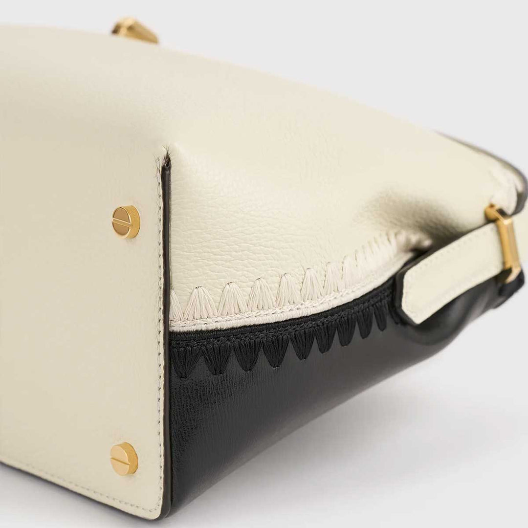 T-lock embroidered leather top handle