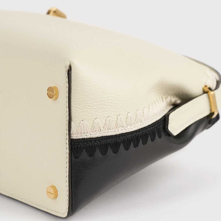 T-lock embroidered leather top handle