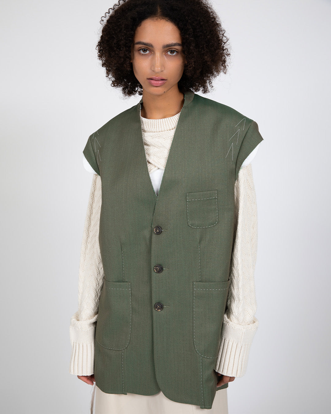 DECONSTRUCTED SLEEVELESS BLAZER